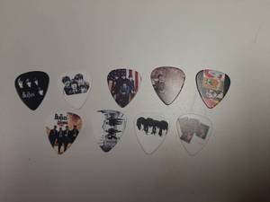 lot 214 image: 9 Beatles Guitar Picks