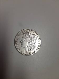 lot 215 image: 1882 Morgan Silver Dollar