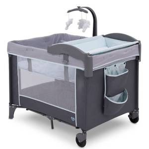 lot 73058 image: Delta Children LX Deluxe Portable Baby Play Yard With Removable Bassinet and Changing Table, Eclipse