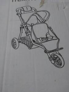 lot 7038 image: Fash N Color Baby Doll Buggy 3 wheels