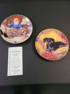 lot 1025 image: Set of 2 puppy playtime plate collection by Jim Lamb
