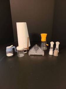 lot 1125 image: A sorted kitchen utensils including paper towel holder, salt and pepper shakers, napkin holder