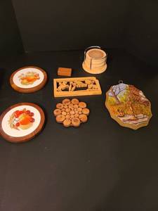 lot 1135 image: Assorted trivetts and coasters