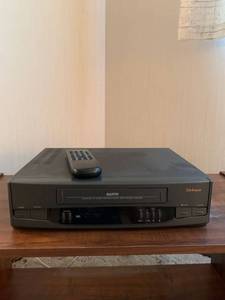 lot 1215 image: Sanyo VHS player with remote