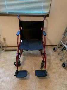 lot 1305 image: Wheelchair with foot rests