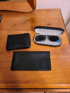 lot 1418 image: Wallet, checkbook cover and glasses