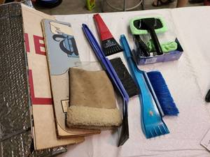 lot 3054 image: Car shades and ice scrapers