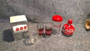lot 281 image: Vintage Coca Cola Memoribelia - Napkin Dispenser, Salt & Pepper Shakers, and More