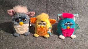 lot 330 image: Three Vintage Furby by Tiger Electronics Animatronic Toys