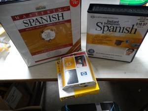 lot 2882 image: Lot of CD Sleeves, Ink Cartridge and Spanish Language Audio