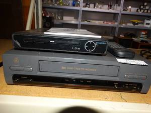 lot 3027 image: Sylvania DVD Player with Remote and Instructions and VHS Player