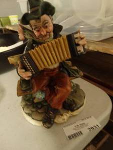 lot 2931 image: Porcelain Man Playing Accordion