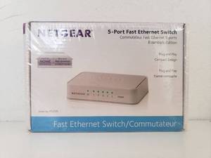 lot 9014 image: Netgear 5PORT FAST ETHERNET SWITCH