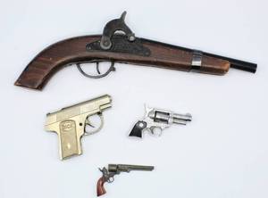 lot 2026 image: Mid Century Toy Cap Guns - Civil War Musket Kadet Savannah, Tenn., Nichols Paint Tiny Cap Gun, DICK Silver Cap Gun and Marx Small Cap Gun