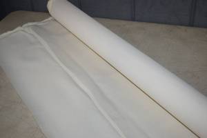 lot 123 image: Roll Cream Waterproof Fabric 60 x at least 10 yards