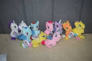 lot 297 image: 10 My Little Pony Cutie Cuff Slap Bracelets