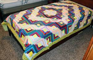 lot 6061 image: Antique Quilt - Colorful Log Cabin Pattern with Green & White Floral Backing 64 x 78