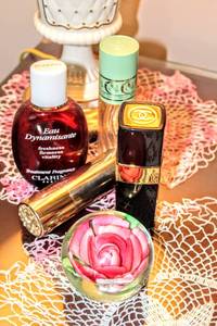 lot 6107 image: 4 Perfume Bottles (2) Refillable and Lillian Vernon Rose Paperweight