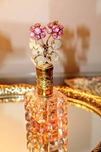 lot 6109 image: Vintage Australian Pink Glass Perfume Bottle with Rhinestone Topper