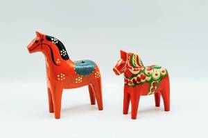 lot 6083 image: 2 Swedish Wooden Dala Horses by Nils Olsson and Bo Svensk plus Vintage Swedish Postcard