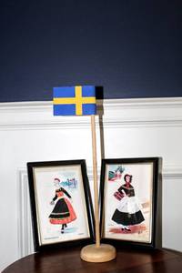 lot 6143 image: (2) Vintage Framed Swedish Sodermansland and Amager Folk Stitch Costume Signed Postcards and Wooden Flag