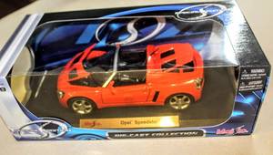 lot 6198 image: Special Edition Maisto Opel Speedster #31662  and Jeep Wrangler Sahara #31615, Both 118 Scale and in Original Sealed Box