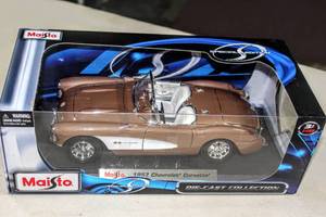 lot 6201 image: Special Edition Maisto 1957 Chevrolet Corvette #31139 and 1949 Ford #31682, Both in Original Sealed Box