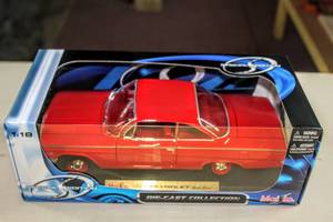 lot 6203 image: Special Edition Maisto 1962 Chevrolet Bel Air #31641  and 1957 Chevrolet Corvette #31139, Both 118 Scale and in Original Sealed Box