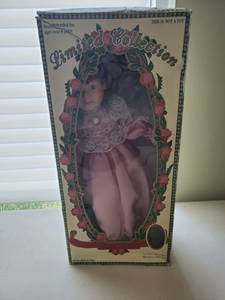 lot 6120 image: Limited Edition Porcelin Doll in Pink Dress