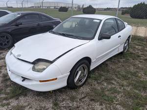 lot 1276 image: 1999 Pontiac Sunfire SE Coupe - Vin 1G2JB1249X7530056