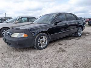 lot 1310 image: 2002 Mazda 626 - Vin 1YVGGF22C525306935