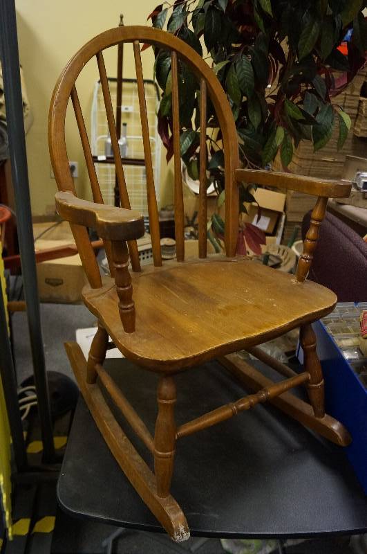 lot 1122 image: Childs wooden rocking chair