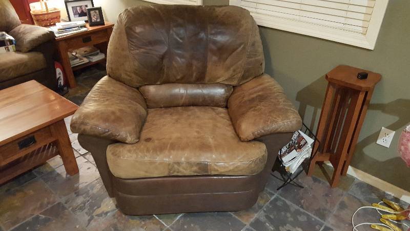 lot 1019 image: Brown leather recliner...