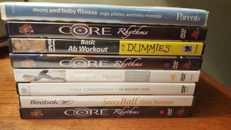 lot 1027 image: (8) workout DVD lot...