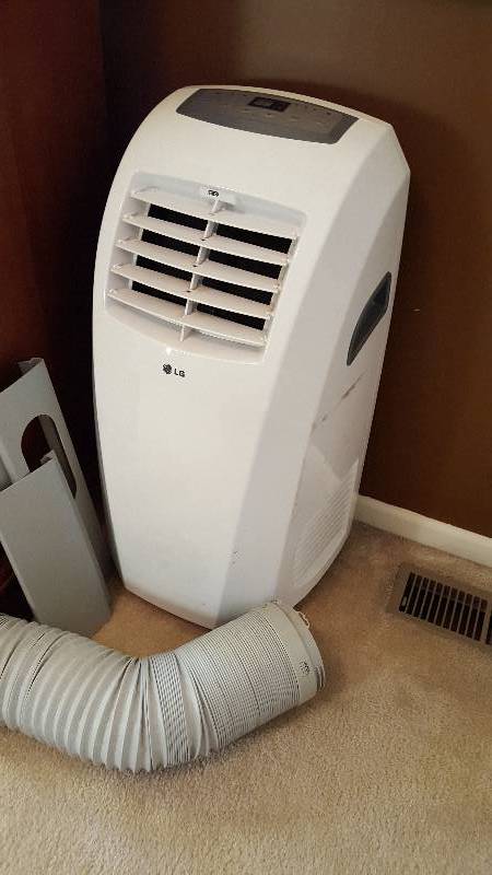 lot 1076 image: LG air conditioning unitMod...