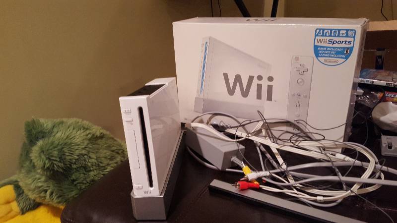 lot 1109 image: Nintendo Wii video game console and...