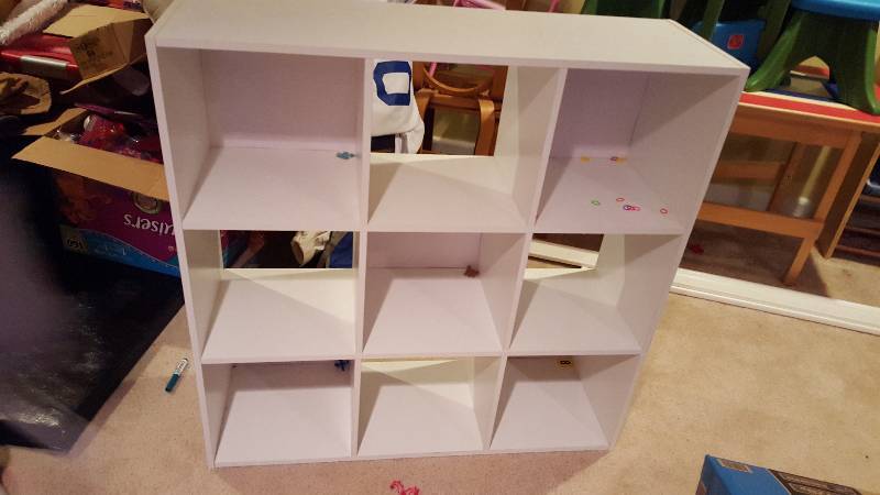 lot 1122 image: 9 compartment white storage shelf...