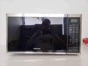 lot 75030 image: Samsung 1.4 cu. ft. Countertop Microwave- Stainless Steel