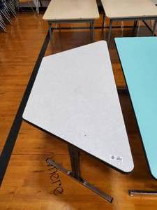 lot 180 image: Trapezoid Table 56 in x 25 in