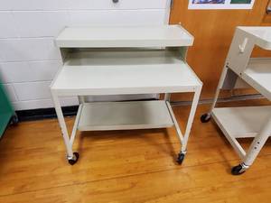 lot 272 image: Metal Desk on Wheels 36 in x 25 in