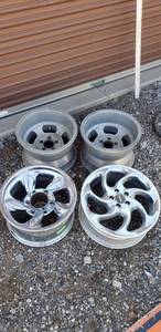 lot 6006 image: 4 rims - 2 aluminum 16 inch. 1 chrome 17 inch. 1 chrome 18 inch
