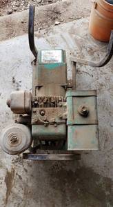 lot 6025 image: Powermate 43 series gas generator with a 39 Briggs & Stratton engine - rope retractor needs adjusted.