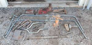lot 9341 image: Topper frames, jack, pipes, heavy duty tools, tow hooks, iron base