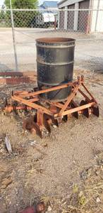 lot 2020 image: 3 pt. 4 Gang Off set Disc  5ft Barrel is filled with sand for weight