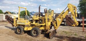 lot 2030 image: Vermeer V450 Trencher Tractor with John Deere Diesel engine, V7800 Backhoe with 18 Bucket, V64 6-way Backfill Blade, VS12 Trencher with 60 Boom, 10 end Idler, 3990M Chain with 6 cup Cutters & Manual Crumber 1117 hours - Pick Up by Appt. on 71520