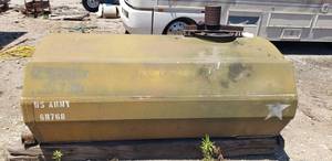 lot 2074 image: Vintage US Army Fiberglass 400 gal. tank  has been used to store used oil