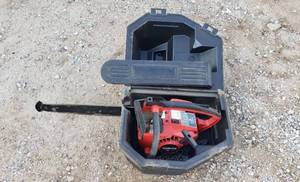 lot 1005 image: Homelite XL  16 in. Chainsaw  has compression and Case
