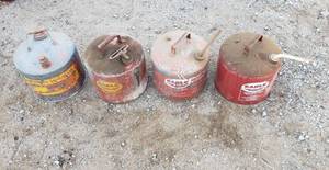 lot 1009 image: (4) Metal 5 gal Gas Cans