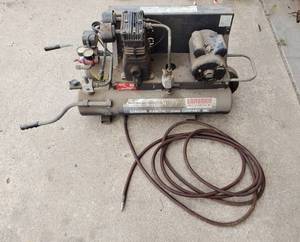 lot 1024 image: Sanborn Industrial Air Compressor 8 gallon 2hp Motor with Hose