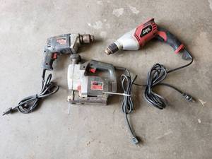 lot 1057 image: Skil Jig Saw and (2) Drills